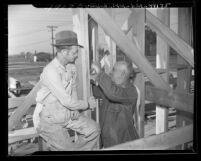 Elmer Thayer and Enos Roush at church-raising bee in Rosemead, Calif., 1947