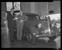 Bill Froelich presents new car to Times Contest winner Harry Ackelson, Los Angeles, 1936