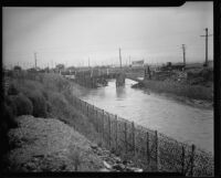 Fallen bridge over the Los Angeles River at Washington Blvd., Los Angeles, 1920-1939