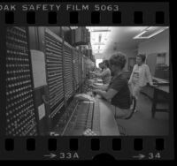 Telephone operators working the manual switchboard in Avalon, Santa Catalina Island, Calif., 1977