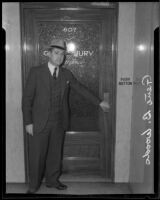 Chief of Police of San Marino, at the door to the county grand jury room, Los Angeles, 1935