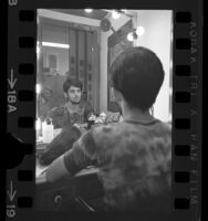 Gabe Kanata wearing wig over long hair, Los Angeles, Calif., 1970