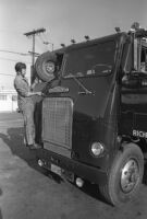 Wheel lodged in gasoline truck's windshield, Southern California, 1969