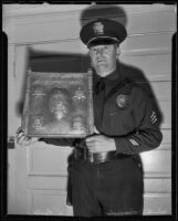 Sargent Wallace E. Lund designs bronze L. A. P. D. plaque, Los Angeles, 1935