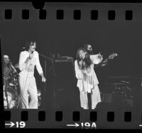 James Taylor and Carly Simon performing onstage in Los Angeles, Calif., 1975