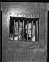 Dan McNally and Jonathan Perkins Posing Behind Bars, Los Angeles, 1935