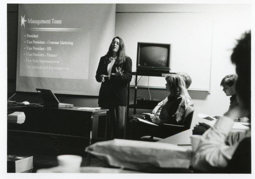 Photograph of a woman lecturing