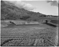 Flood basins above Altadena filled with rainwater. Circa February 15, 1936