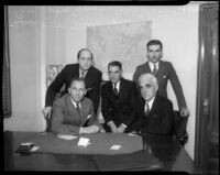 District Attorney Buron Fitts meets with his advisors over perjury charges, Los Angeles, 1934