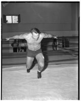 Wrestler and football player Bronko Nagurski in the ring before his match against Vincent López at Wrigley Field, Los Angeles, 1937