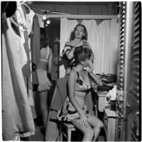 Swim suit models in their dressing room before a fashion show featuring local designers, Los Angeles, September 1946