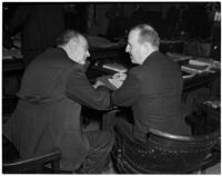 Attorneys Dixwell L. Pierce and Eugene Williams sit in a courtroom, Los Angeles, 1940