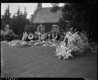 Shrine of flowers around Jean Harlow's home after her death, Los Angeles, 1937