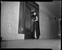 Film actress Anna May Wong entering District Attorney Buron Fitts' office, Los Angeles, 1937