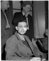 John Frank Reavis awaiting the decision on his indictment for the murder of Alice "Jerry" Burns, Los Angeles, February 28, 1940