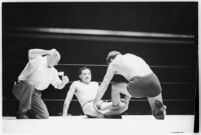 Heavyweight wrestler Vincent López grappling with newcomer El Pulpo at the Olympic, Los Angeles, 1937