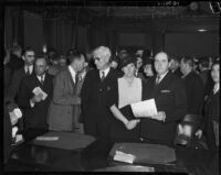 District Attorney Buron Fitts and his sister Mrs. Berthal Gregory appear with their attorneys, Los Angeles, 1934