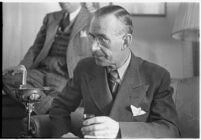 German author Thomas Mann seated in a chair, Los Angeles