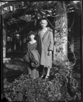 Two unknown women in the aftermath of a forest fire, Altadena, California, October 1935