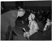 Dr. George K. Dazey and his third wife, Dorcas Dazey, at the trial where Dr. Dazey is accused of the murder of his second wife, Doris S. Dazey, Los Angeles, 1939-1940