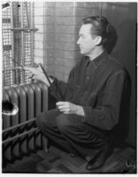 Murder suspect Robert S. James in his jail cell, Los Angeles, 1936