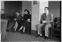 Private detective Pearl Antibus appears in court with her daughter Norma Thelan and son Robert Antibus during her trial against millionaire Thomas W. Warner, Sr, Los Angeles, 1938