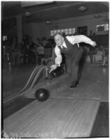 Howard Jones, USC football coach from 1925-1940, bowling, Los Angeles, circa 1940