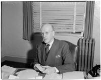 Judge Stanley Moffatt at his desk, Huntington Park, 1930-1950