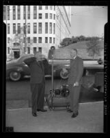 Los Angeles councilman J. Win Austin and mayor Fletcher Bowron testing an air raid siren in 1942