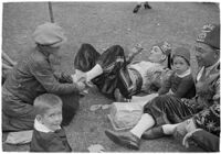 Nile Shrine members lounging on the grass, Los Angeles, 1938