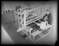 Men work on machinery used at a rehabilitation plant for paroled workers, Los Angeles, 1930s