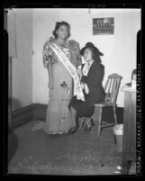 Miss Philippine Commonwealth of 1939 Gloria Talaugon with Guadalupe Palomo Malasig of Los Angeles, 1940