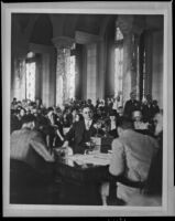 Detective Joe Filkas appears a press conference involving the murder of Celia L. Holmes, Los Angeles, 1935