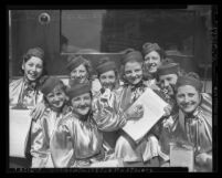 Group of women dressed in identical outfits that solicited signers for Mayor Frank Shaw recall petition in Los Angeles, 1938