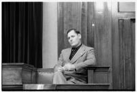 Ambulance driver Harry T. Meredith on the witness stand during the murder trial of Paul A. Wright, Los Angeles, 1938