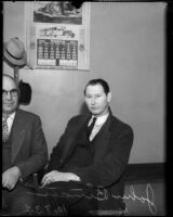 John Binan sits next to Captain Wallis while being questioned over the homicide of Louise Appier, Los Angeles, 1935