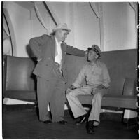 Tony Cornero with Capt. Robert C. Burdett, the skipper of his newly refurbished gambling ship, the Bunker Hill or Lux, Los Angeles, 1946