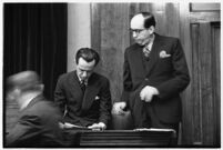 Accused murderer Paul A. Wright being questioned in court, Los Angeles, 1938