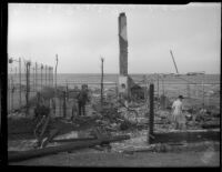 Remnants of destroyed home on Malibu beach after a fire, circa October 1935