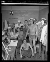 Male cast members of "South Pacific" backstage in their dressing room, Los Angeles, Calif., 1950