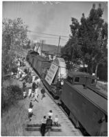 Crowds gather in Pasadena to see the arrival of the 200-inch lens for the future Hale Telescope, largest in the world when completed. April 10, 1936