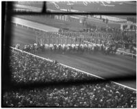 Horses race out of the gate on Derby Day at Santa Anita, February 22, 1937