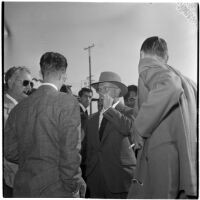 Herbert J. Yates, founder and president of Republic Pictures, with three unknown men, Los Angeles, 1940s