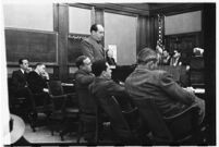 Defense attorney Jerry Giesler in court during the trial of accused murderer Paul A. Wright, Los Angeles, 1938