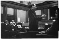 Defense attorney Jerry Giesler in court during the trial of accused murderer Paul A. Wright, Los Angeles, 1938