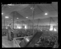 Evangelist Jack Shuler preaching at tent revival called Christ for Greater Los Angeles, Calif., 1953