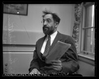 Dr. Louis Finkelstein, president of the Jewish Theological Seminary of America, 1/2 length portrait, 1948