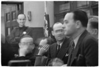 Police Captain Earle E. Kynette sits in court after being charged with conspiracy to commit murder, Los Angeles, 1938