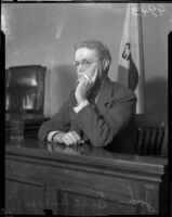 Jury foreman Dr. John P. Buckley at the Los Angeles County Grandy Jury trial for District Attorney Buron Fitts, Los Angeles, 1934