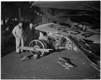 Airplane wreckage after head-on collision with an automobile at Clover Field, Santa Monica, 1937